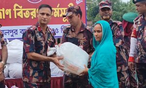 BGB officials handing out BGB relief Jamalpur supplies to river erosion victims.